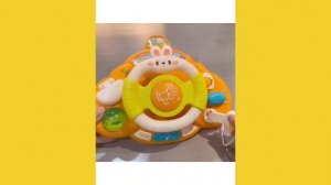 Музыкальный Руль оранжевый TrendToys для малышей развивающий LDG052