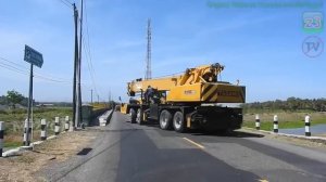 Разгрузка автокрана и установка длинноходного экскаватора-амфибии Komatsu PC210