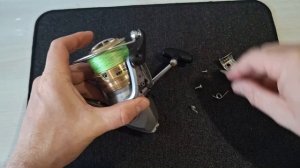 Замена пружины возврата дужки лескоукладывателя на  рыболовной катушке DAIWA Crossfire 3000
