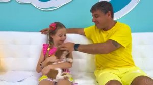 Настя заботится о своем щенке по кличке Лайк