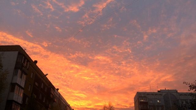 Закат над домами