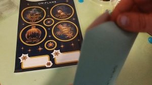 Упаковка новогоднего  подарка с Орифлейм