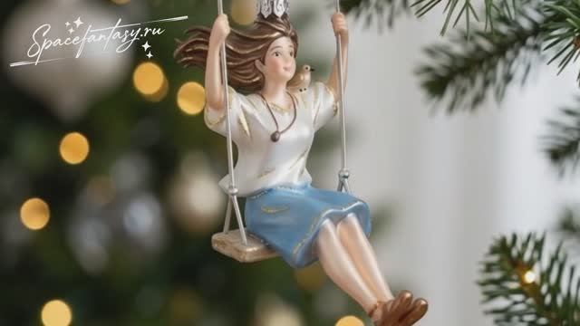 Елочная игрушка с Эли на качелях - персонаж из комикса Дары бродячих льдов