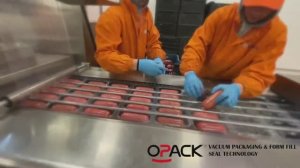 Упаковка минибатонов в мягкие пленки под вакуумом на термоформере OPACK QZ 1000 MAXI