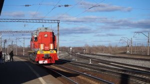 Тепловоз ТЭМ18ДМ-1201 с мегаприветствием.