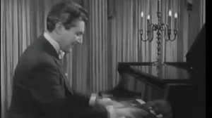 Liberace plaing Nola