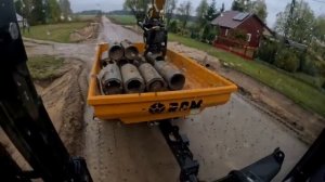 Конвертоплан Cat M317F Engcon | укладка труб на пандусах