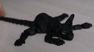 Черный 3D-кот-сфинкс — это не просто фигурка, а хранитель тайн и проводник в мир фантазий.