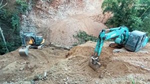 Строительство горных дорог: Опытный экскаваторщик за работой |