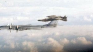 F-4 Fighter Does a Barrel Roll Around a Soviet Bomber