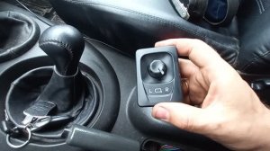 Замена кнопки привода электрозеркал в автомобиле ВАЗ 2123 Нива Шевроле