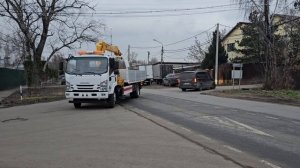 ИСУЗУ ISUZU эвакуатор с КМУ XCMG SQS-100-4 с съемными и откидными алюминиевыми бортами и корзиной 2