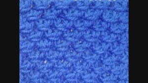 Узор с обхватывающими петлями. Спицы