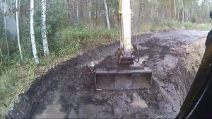 Очистка русла канавы длинноруким экскаватором. Long Reach Excavator Dredging Canal.