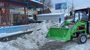 Минитрактор Mitsubishi уборка снега фронтальном погрузчиком