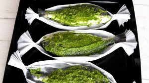 Дорадо в зелёном соусе