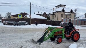 Уборка снега погрузчиком минитрактором Kubota
