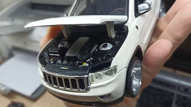 Jeep Grand Cherokee IV'2010 Laredo 4x4 V8 4.7L. 1-24 Maisto. Белый+ смотреть онлайн