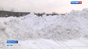 Большой снегоотвал рядом с домом угрожает новосибирцам весенним потопом