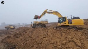 KOMATSU-высокоточная добыча полезных ископаемых в сложных условиях