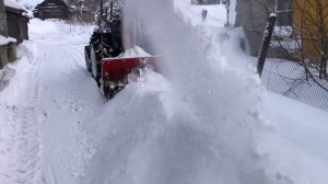 Чистка снега снегоротором на японском тракторе