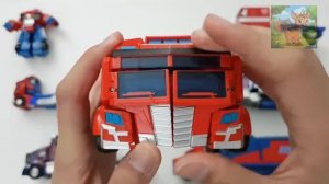 Различные роботы-трансформеры Оптимуса Прайма, которые не были замаскированы под деформацию в фильме