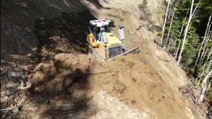 Forest road construction with Liebherr 746 bulldozer