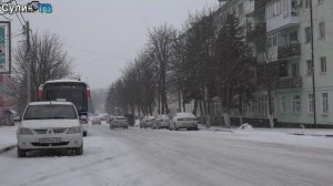 Город окутан снегом