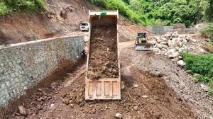 Impressive Nature of the Video Truck Bulldozer Team Takes a Detour On Mountain Road Building