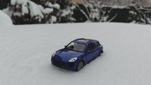 Модель Porsche Macan от Welly