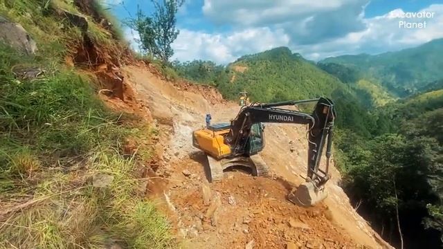 Строительство крутой горной дороги экскаватором: Тяжелая Техника в действии смотреть онлайн