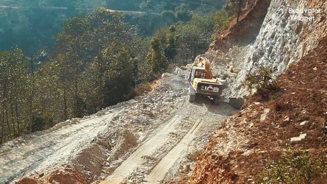 Погрузка самосвалом и сбор камня для дорожного строительства | смотреть онлайн