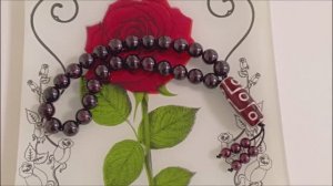 Четки из натуральных камней. Четки из граната с бусиной дзи