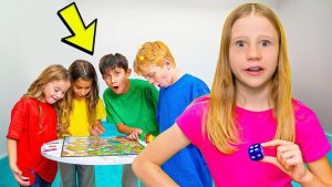 Настя с друзьями играют в гигантскую настольную игру