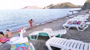 Моя внучка, мы на море в Крыму. Мои изделия вязаные для внучки.