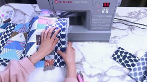 Как превратить кусочки ткани в красивую сумку в стиле пэчворк.