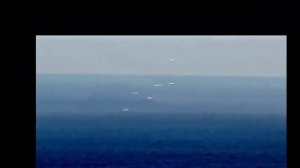 Флотилия НЛО над океаном