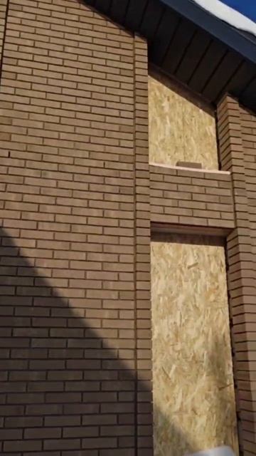 Дом с кирпичным фасадом