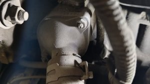 Где находится термостат Toyota Corola Fielder двигатель 1NZ-FE