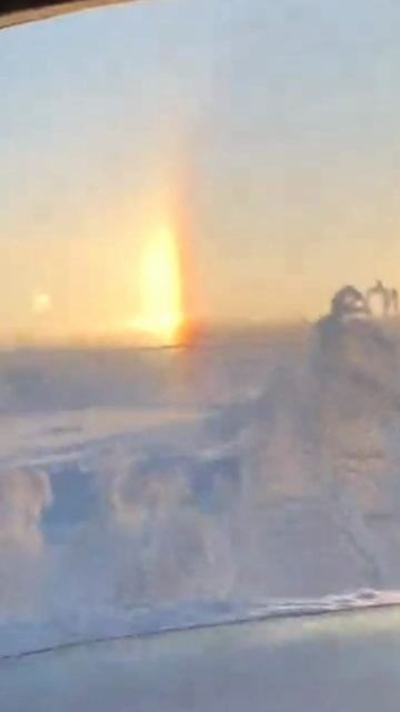 Солнечное гало на трассе у Териберки в Мурманской области