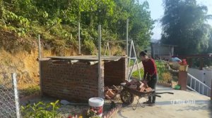 Building a Durable Storage Shed with Red Bricks Steel and Roofing Sheets Lý Hồng Quản
