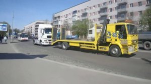 Эвакуатор IVECO буксирует MAN TGX