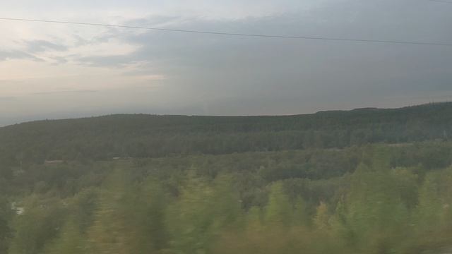 вид из окна поезда,где то на Урале