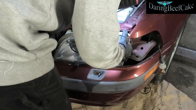 Volvo V40 S40 2000 headlight and indicator removal and replacement