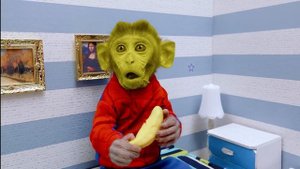 Animal Monkey BinBin takes colorful to go eats M&M candy