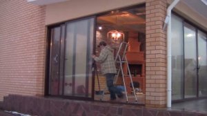 Установка теплых сдвижных алюминиевых дверей