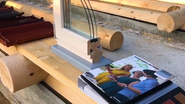 Баня с бассейном из оцилиндрованного бревна.
