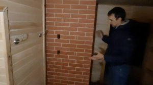 Банная печь из чугуна с топкой через стену.