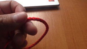 Браслет красная нить от сглаза на затяжке