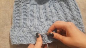 Как распустить вязаную вещь снизу